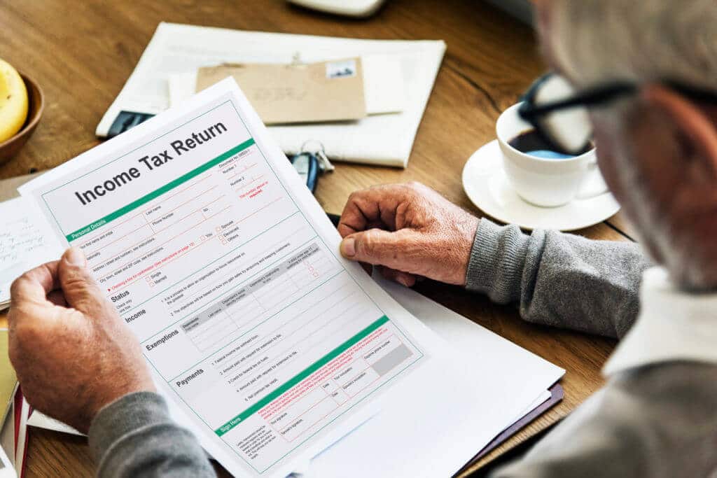 income tax return deduction refund concept PFNXY9G