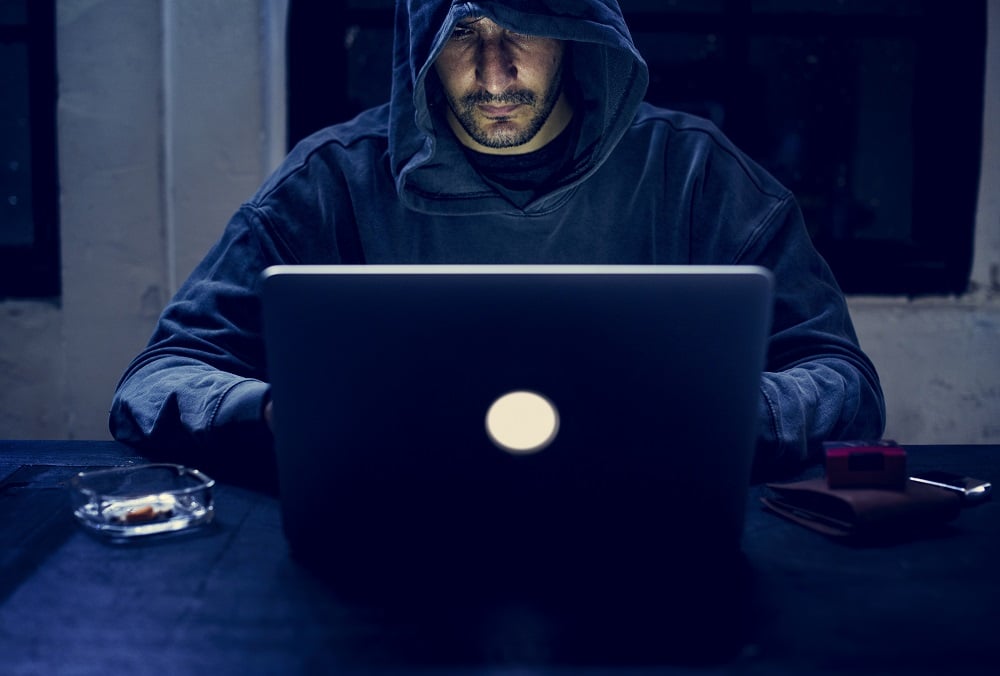 Hacker working on computer cyber crime